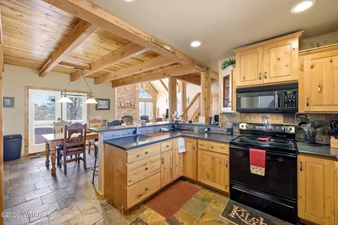 Kitchen - 2337 Puma Cir, Overgaard, AZ 85933 photo 2 of 3