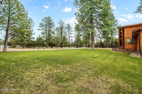 Exterior - 2922 Pine Rim Rd, Overgaard, AZ 85933 photo 4 of 12