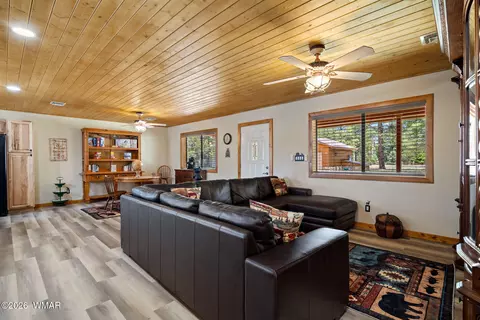 Living - 2924 Pine Rim Rd, Overgaard, AZ 85933 photo 2 of 3