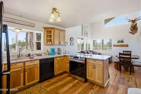 Kitchen - 3418 Aztec Dr, Overgaard, AZ 85933 photo 2 of 3