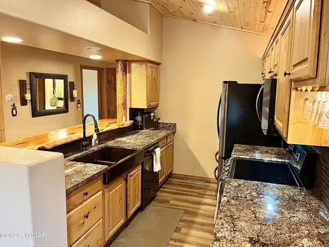 Kitchen - 2334 N Buffalo Loop, Overgaard, AZ 85933 photo 1 of 1