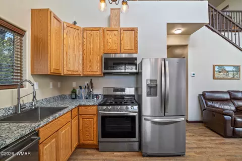 Kitchen - 3331 Ox Bow Bnd, Overgaard, AZ 85933 photo 2 of 2