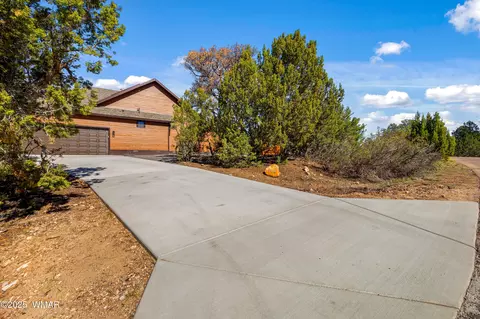 Exterior - 2268 Roundabout Cir, Overgaard, AZ 85933 photo 3 of 11