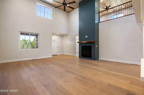 Living - 2268 Roundabout Cir, Overgaard, AZ 85933 photo 3 of 4