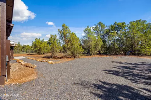Exterior - 2268 Roundabout Cir, Overgaard, AZ 85933 photo 4 of 11