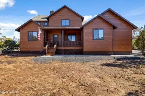 Exterior - 2268 Roundabout Cir, Overgaard, AZ 85933 photo 6 of 11
