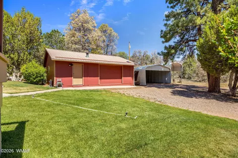 Exterior - 3130 Ranch Rd, Overgaard, AZ 85933 photo 7 of 9
