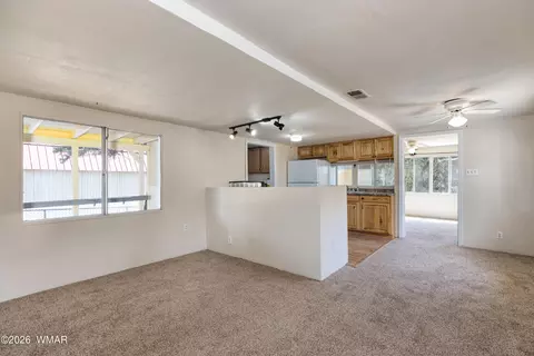 Living - 3611 Pine Rim Dr, Overgaard, AZ 85933 photo 2 of 2