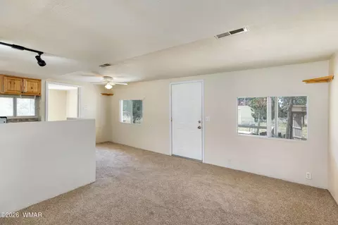 Living - 3611 Pine Rim Dr, Overgaard, AZ 85933 photo 1 of 2