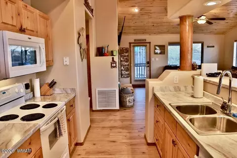 Kitchen - 2334 S Buffalo Loop, Overgaard, AZ 85933 photo 2 of 2