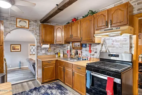 Kitchen - 2144 Indian Trl, Overgaard, AZ 85933 photo 3 of 4