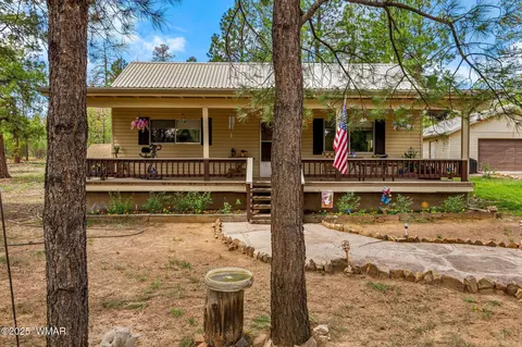 Exterior - 2840 Pine Rim Rd, Overgaard, AZ 85933 photo 4 of 14