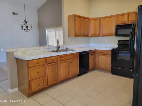 Kitchen - 20558 E Mesa Verde Rd, Mayer, AZ 86333 photo 2 of 3