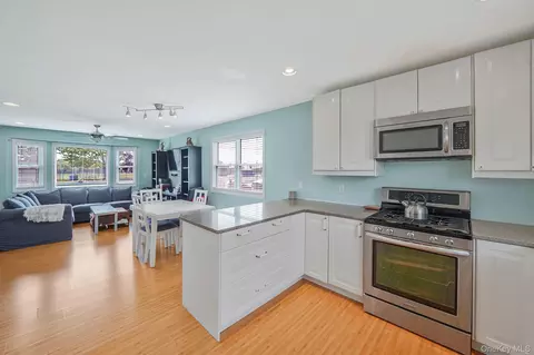 Kitchen - 374 Rider Ave, Patchogue, NY 11772 photo 2 of 3
