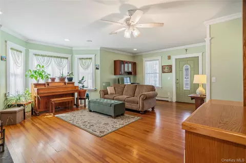 Living - 115 Cedar Ave, Patchogue, NY 11772 photo 2 of 2