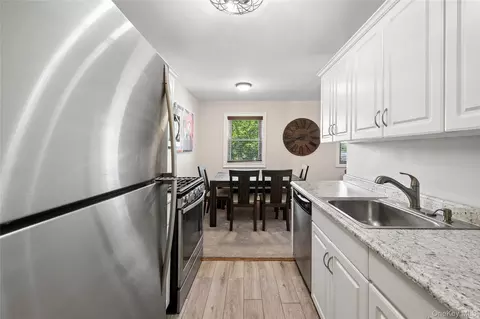 Kitchen - 260 Waverly Ave #49, Patchogue, NY 11772 photo 1 of 2