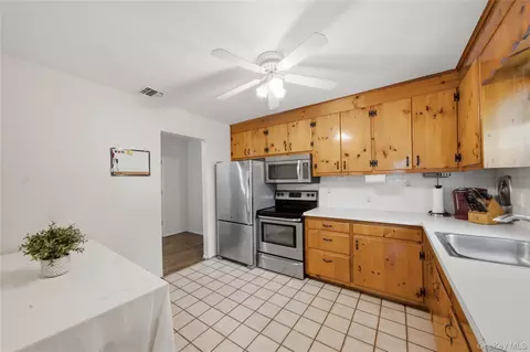Kitchen - 58 Highland Ave, Patchogue, NY 11772 photo 2 of 3