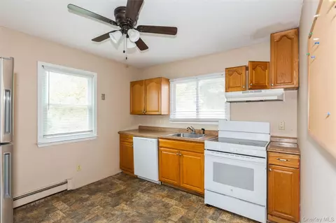 Kitchen - 23 S Summit Ave, Patchogue, NY 11772 photo 1 of 1