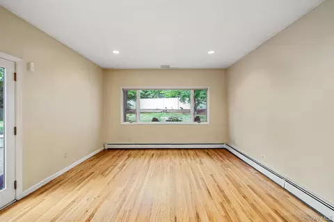 Living - 61 Ledgewood Dr, Smithtown, NY 11787 photo 7 of 7