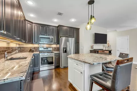 Kitchen - 111 Millie Ct, Patchogue, NY 11772 photo 2 of 4