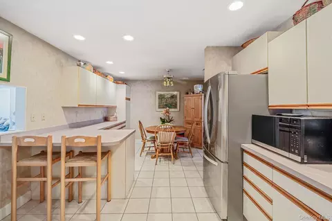 Kitchen - 15 Edwin Ave, Patchogue, NY 11772 photo 2 of 3