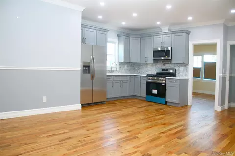 Living - 1048 E 98 St, Brooklyn, NY 11236 photo 1 of 3