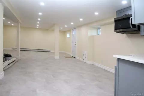 Living - 1048 E 98 St, Brooklyn, NY 11236 photo 3 of 3