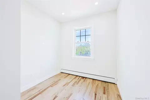 Bedroom - 58-13 69th Pl, New York, NY 11378 photo 9 of 11