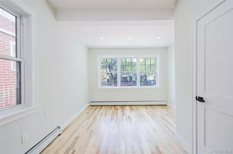 Living - 58-13 69th Pl, New York, NY 11378 photo 2 of 5