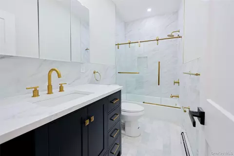 Bath - 58-13 69th Pl, New York, NY 11378 photo 1 of 4