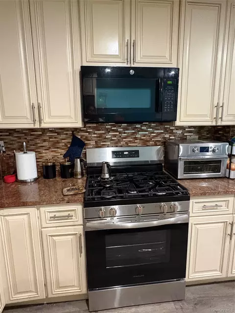 Kitchen - 277 Graff Ave, New York, NY 10465 photo 2 of 3