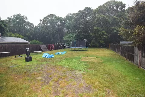 Exterior - 143 Meadowmere Ave, Mastic, NY 11950 photo 3 of 4