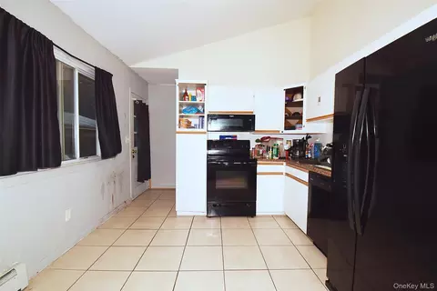 Entry Way - 143 Meadowmere Ave, Mastic, NY 11950 photo 2 of 3