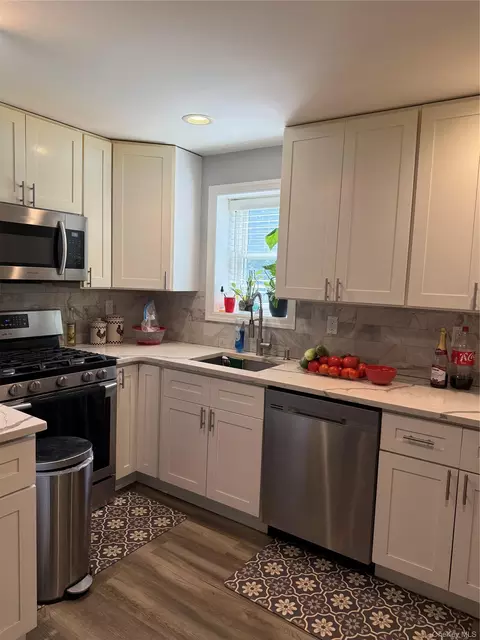 Kitchen - 16 Oak Ave, Riverhead, NY 11901 photo 3 of 4