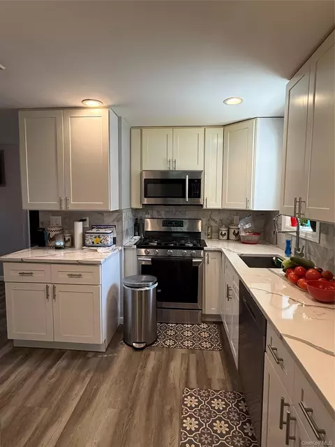Kitchen - 16 Oak Ave, Riverhead, NY 11901 photo 1 of 4