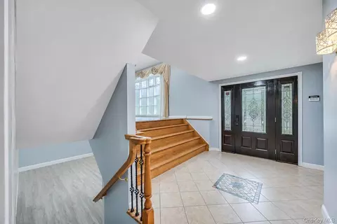 Entry Way - 49 Village Dr, Jericho, NY 11753 photo 1 of 3