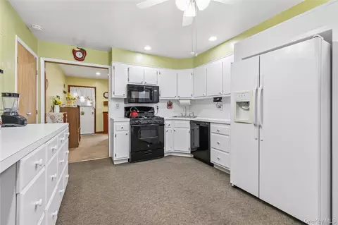 Kitchen - 62 Sharp St, Patchogue, NY 11772 photo 1 of 2