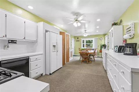 Kitchen - 62 Sharp St, Patchogue, NY 11772 photo 2 of 2
