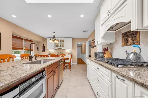 Kitchen - 383 Munsell Rd, Brookhaven, NY 11772 photo 3 of 4