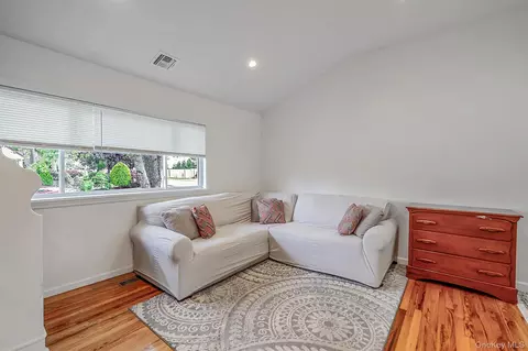 Living - 48 Hillside Ave, Patchogue, NY 11772 photo 1 of 2