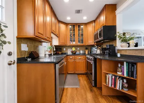 Kitchen - 8 Harrison St, Patchogue, NY 11772 photo 2 of 2