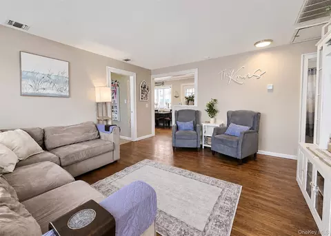 Living - 8 Harrison St, Patchogue, NY 11772 photo 1 of 1