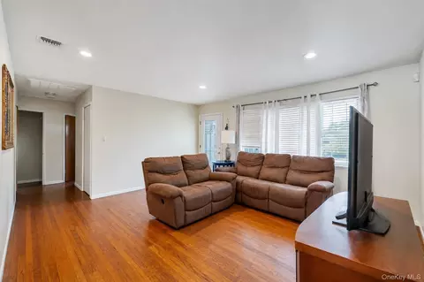 Living - 437 Commack Rd, Islip, NY 11751 photo 1 of 2
