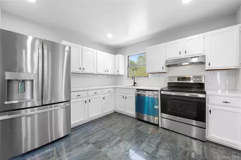 Kitchen - 25 Marshall St, Patchogue, NY 11772 photo 2 of 2