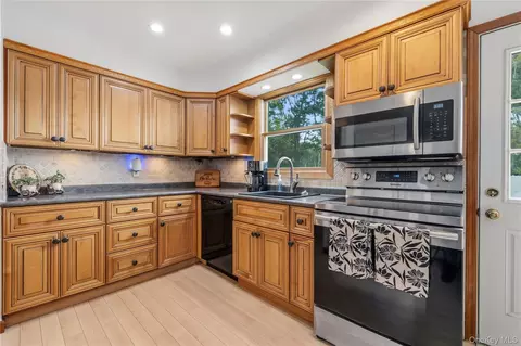 Kitchen - 371 Hewlett Ave, Patchogue, NY 11772 photo 1 of 3
