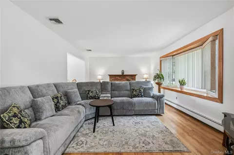 Living - 371 Hewlett Ave, Patchogue, NY 11772 photo 1 of 5