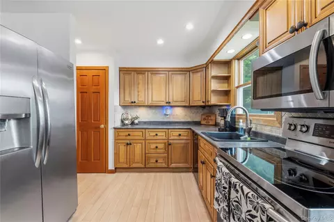 Kitchen - 371 Hewlett Ave, Patchogue, NY 11772 photo 3 of 3