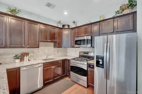 Kitchen - 10 Lager Ln, Patchogue, NY 11772 photo 2 of 2