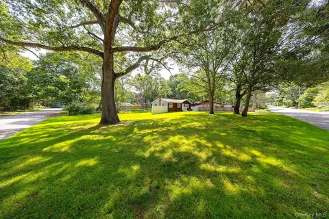 Exterior - 18 Easterly Rd, Hampton Bays, NY 11946 photo 7 of 16
