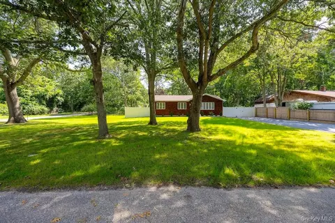 Exterior - 18 Easterly Rd, Hampton Bays, NY 11946 photo 1 of 16